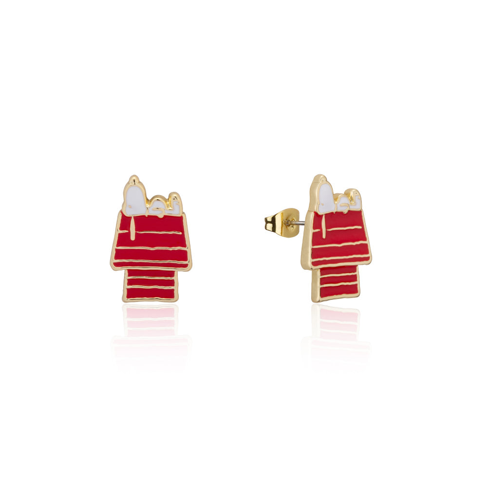 Red and gold snoopy laying on his red dog house stud earrings on a white background