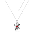 Stainless Steel Necklace with Peanuts  Snoopy holding a red enamel heart pendant on a white background