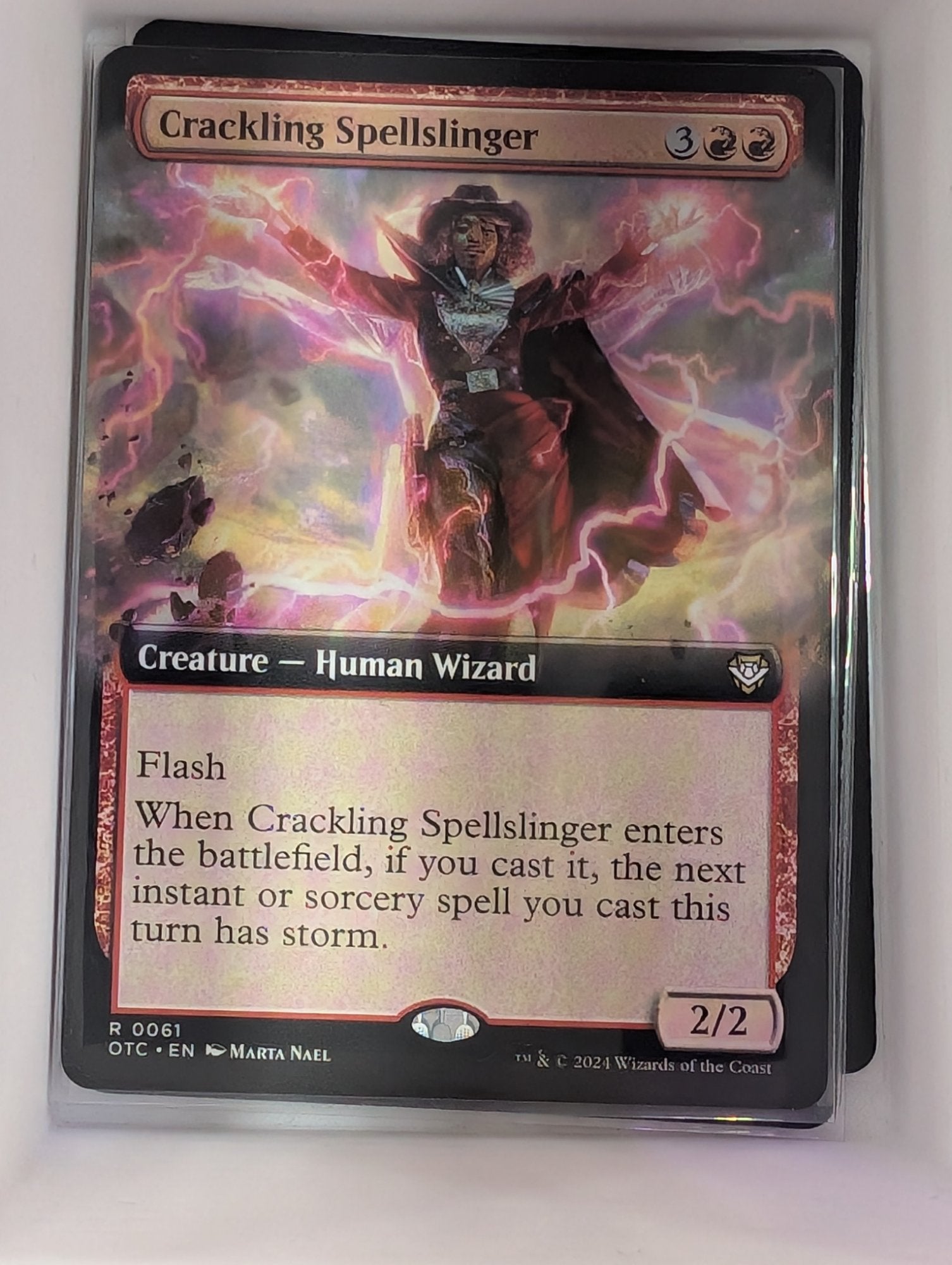 Image of Crackling Spellslinger Outlaws of Thunder Junction Commander (otc) #61